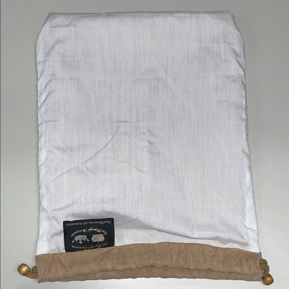 Elegant Tan Faux Suede Drawstring Bag for storage.